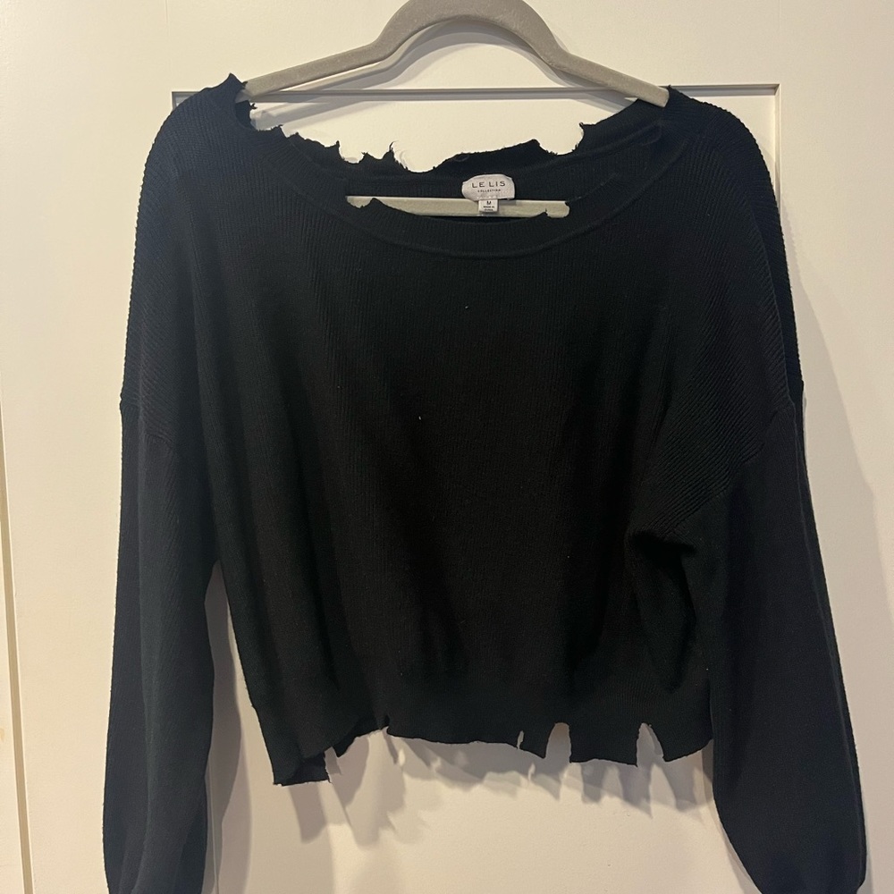 Black sweater with distressed ends